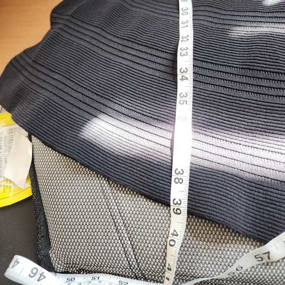 Adolfo Dominguez is a black sophisticated dress. - Picture 5 of 8